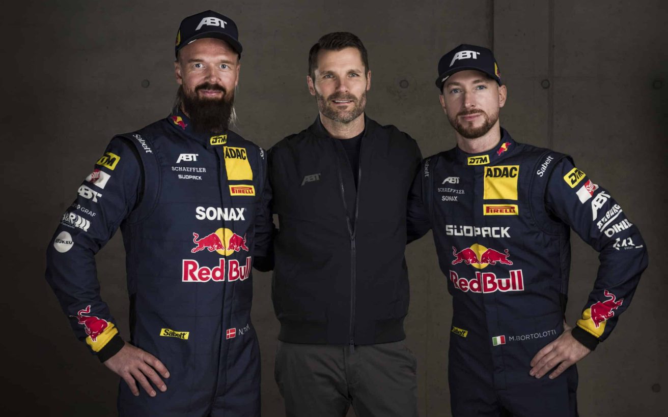 (L-R) Nicki Thiim of Denmark, Martin Tomczyk of Germany, ABT Motorsport director, and Mirko Bortolotti of Italy pose for a photograph prior to the DTM Team ABT Sportsline reveal of their cars and drivers for the 2025 season in Hochgurgl, Austria on February 17 2025.