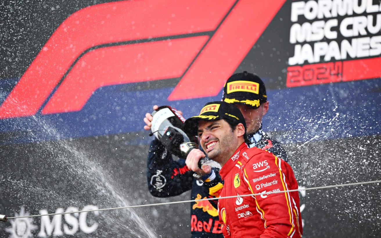 SUZUKA, JAPAN - APRIL 07: Race winner Max Verstappen of the Netherlands and Oracle Red Bull Racing and Third placed Carlos Sainz of Spain and Ferrari celebrate on the podium during the F1 Grand Prix of Japan at Suzuka International Racing Course on April 07, 2024 in Suzuka, Japan. (Photo by Clive Mason/Getty Images) // Getty Images / Red Bull Content Pool // SI202404070442 // Usage for editorial use only //
